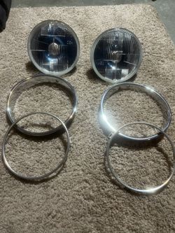 Jeep Wrangler TJ Headlight Set With OEM Bezels