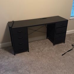 desk with drawer and plugs 