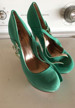 Teal high heels. Size 9.