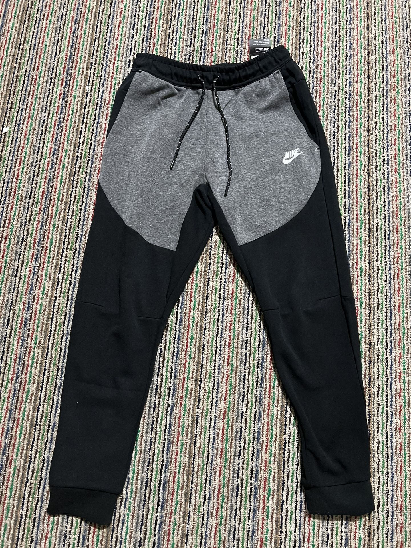 nike tech joggers