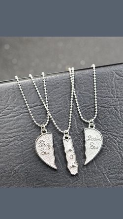 Silver three piece necklace set