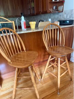 Pair of Oak Swivel Bar Height Chairs