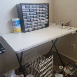 Americrafters folding white sewing craft table with power outlets