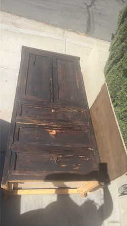 Dark Wood Cabinet with Drawers and Doors