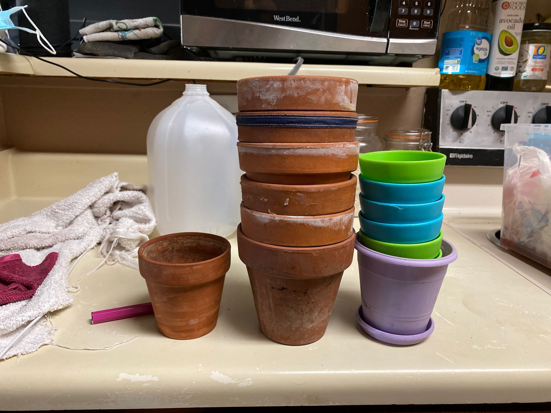 17 different color and size plant pots