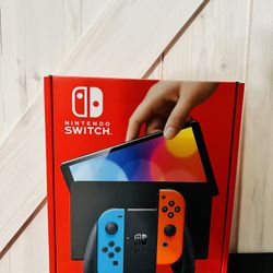 Nintendo Switch OLED Joy-Con - Neon Blue and Neon Red