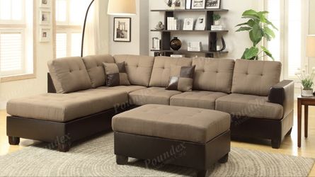 Brand new sectional W/ottoman and pillows