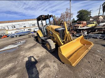 2016 Catapillar 415F Skip Loader W Gannon Box