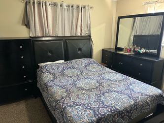 Black bed + side tables