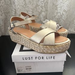 Woman’s  Gold Platform Sandals Size 8.5