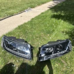 05-11 Audi A6 Headlights