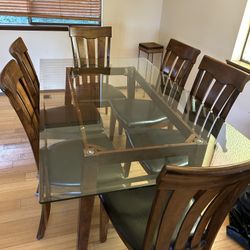 Glass table and 6 chairs