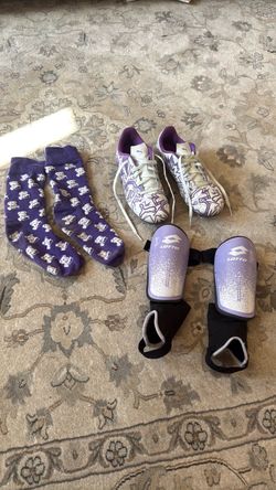 Puma Soccer Cleats with Lotto Shin Guards and matching purple socks size 4