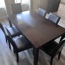 Dinning Table  with 6 chairs , 4 chairs are in poor condition