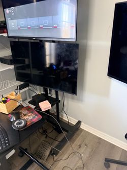 2 TVs Flat Screen TV on Rolling Floor Stand
