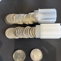 Morgan Silver Dollars And Silver Peace Dollars. 