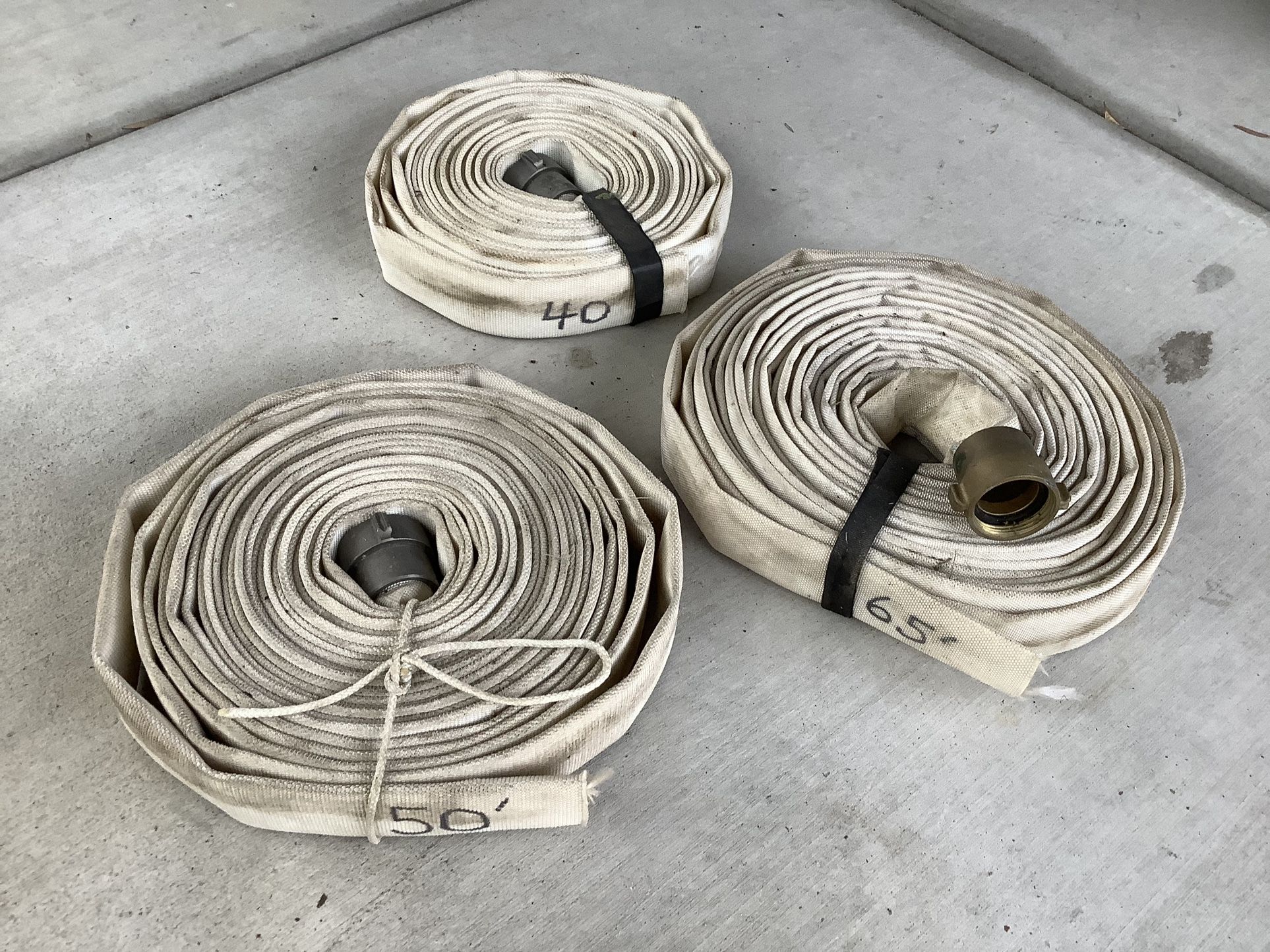 Three 1 1/2” Fire Hoses