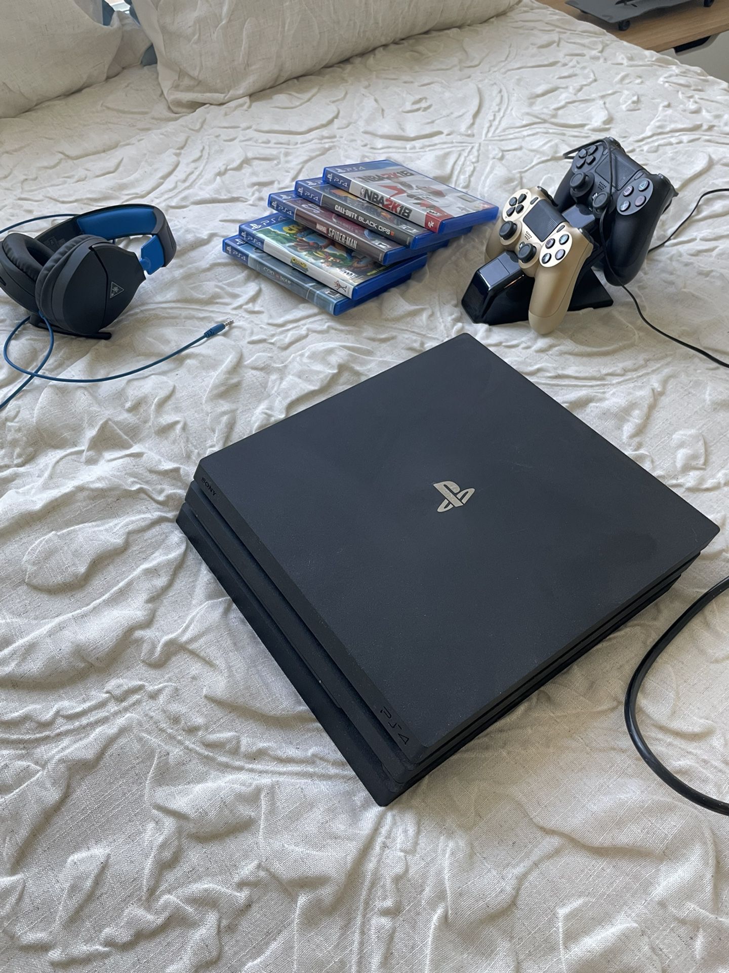 PS4 With 5 Games, 2 Controllers And Turtle Bay Headset