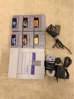 Original Super Nintendo  with games.