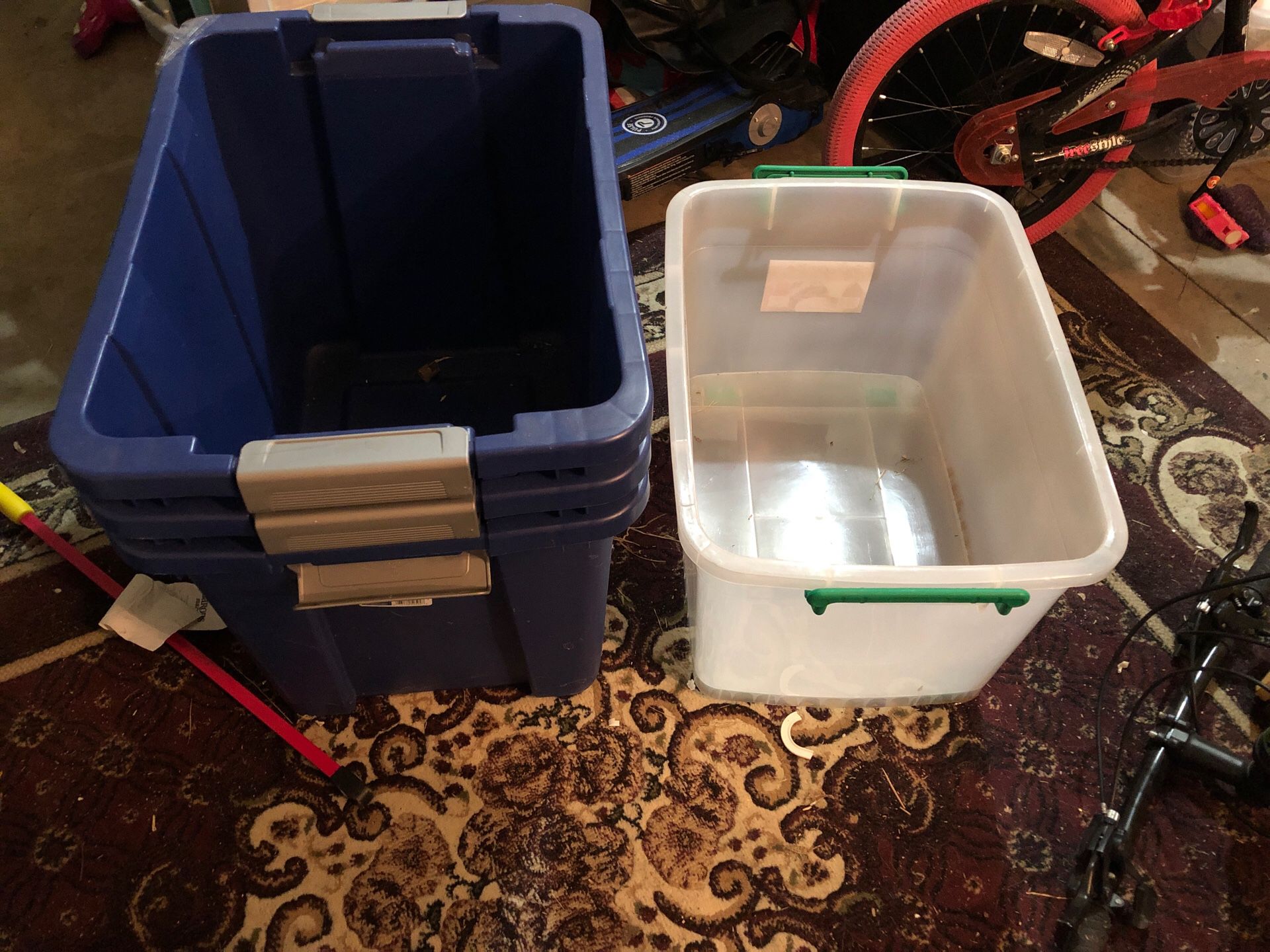 Three 68 liter and 1 48 liter storage box with lid