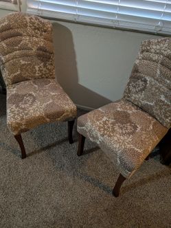 Two beautiful Ashley Furniture Accent Chairs