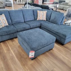 Brand New 2pc Sectional And Ottoman In Blue Cobalt. Ashley Brand 