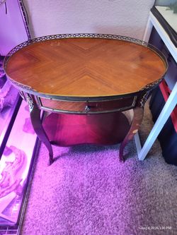 Mid-century French Louis XV Style Inlaid Oval Accent Table with Brass Gallery