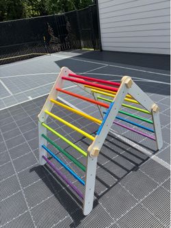 Wood climbing structure