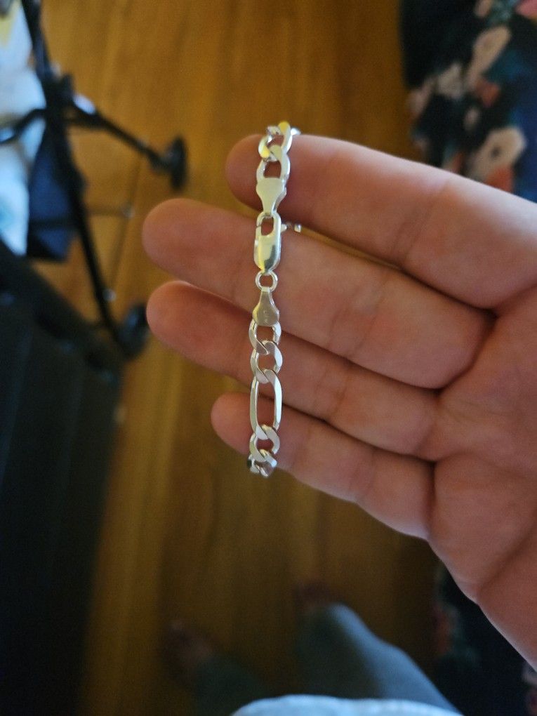 Silver bracelet.
