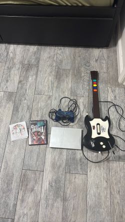 PlayStation 2 with guitar hero
