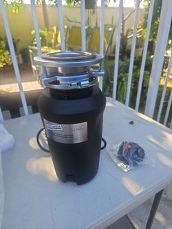 GARBAGE DISPOSAL $50