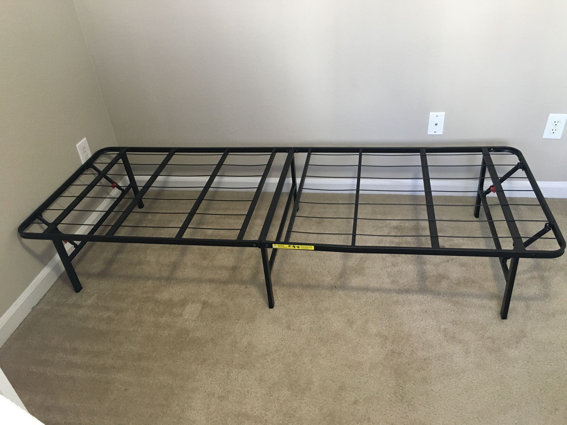 Twin xl bed frame. Folds and closes for easy storage and moving. No need to assemble. Just unfold and its ready to sleep on.