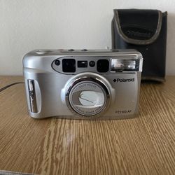 Polaroid Model # PZ2300 AF 35mm Power Zoom 38-90 mm Zoom Lens Point & Shoot