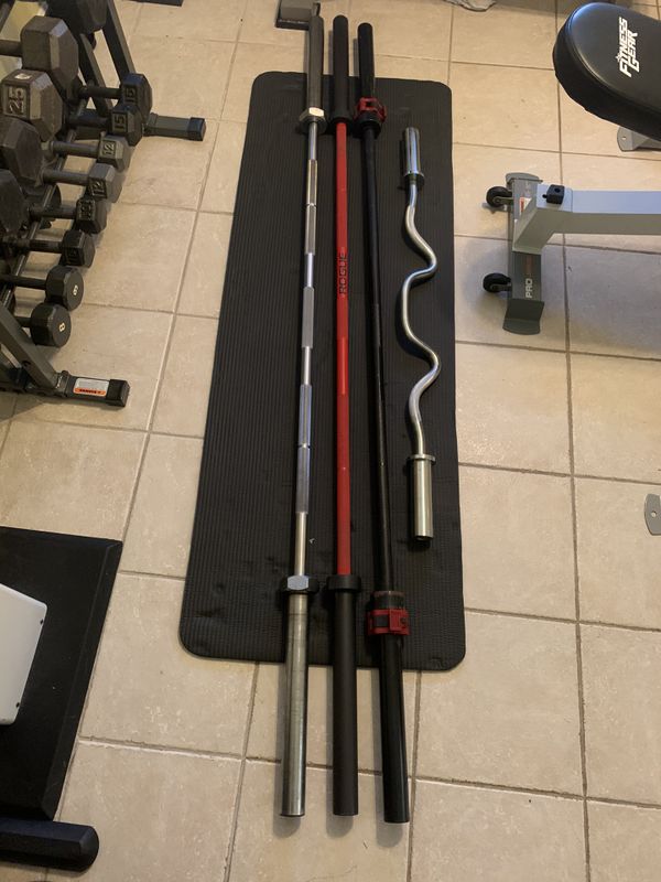 Olympic Barbells for sale 45 lb rogue iron grip for Sale in Miami, FL