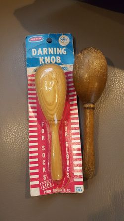 Vintage darning knobs, each