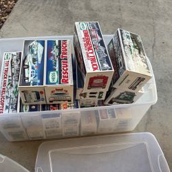 18 New Boxed Vintage HESS Toy Trucks/Helicopters/Cars