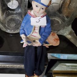 Ceramic Boy With Game Legs Dangle Decor 