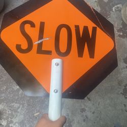 Stop and Slow Sign shoot an Offer