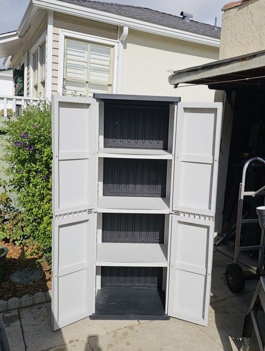Plastic indoor/outdoor storage cabinet, shelves, good for any storage ...