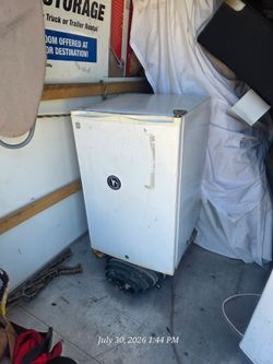 Small fridge with little corner for freezer