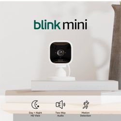 NEW IN BOX Blink Mini - Compact indoor plug-in smart security camera, 1080p HD video, night vision, motion detection, two-way audio, easy set up