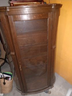 Antique and unique cabinet with glass door. Beautiful addition to your dining. One of a kind.