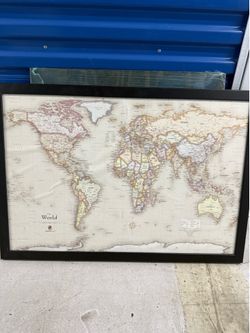 World map with magnetic pins