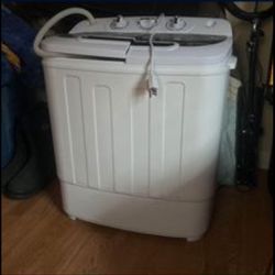 PORTABLE WASHER TURNS ON BUT LOOSE BELT NEEDS REPLACING 