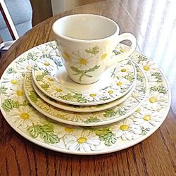 Metlox Poppytrail Sculptured Daisy china.  3-plates 10.5” diameter, 3- salad plate 7.5” diameter, 4- bread plate 4” diameter, 3 saucers 4” diameter an