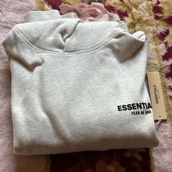 Essential fear of god light grey hoodie