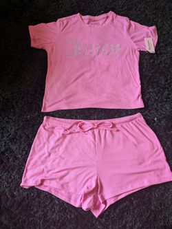 New women's pajamas set available in size medium and large from juicy couture still with tags