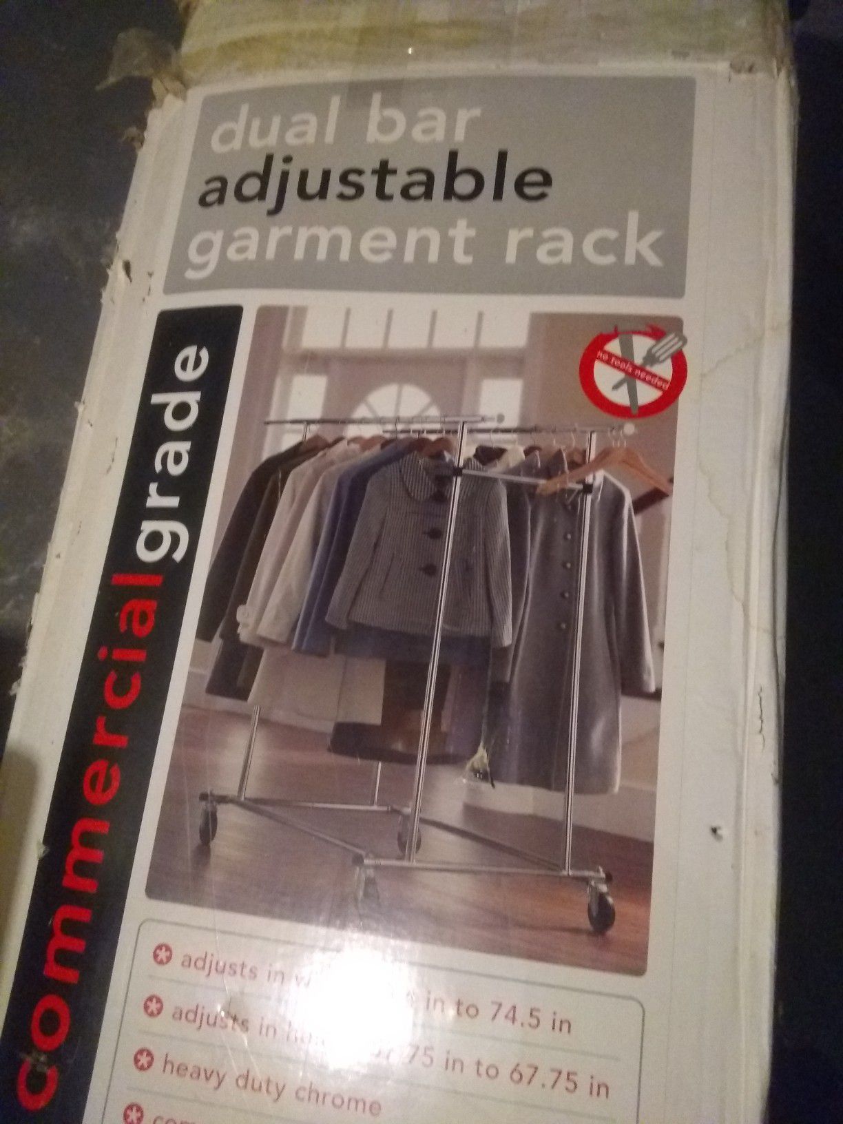 Dual bar adjustable garment rack