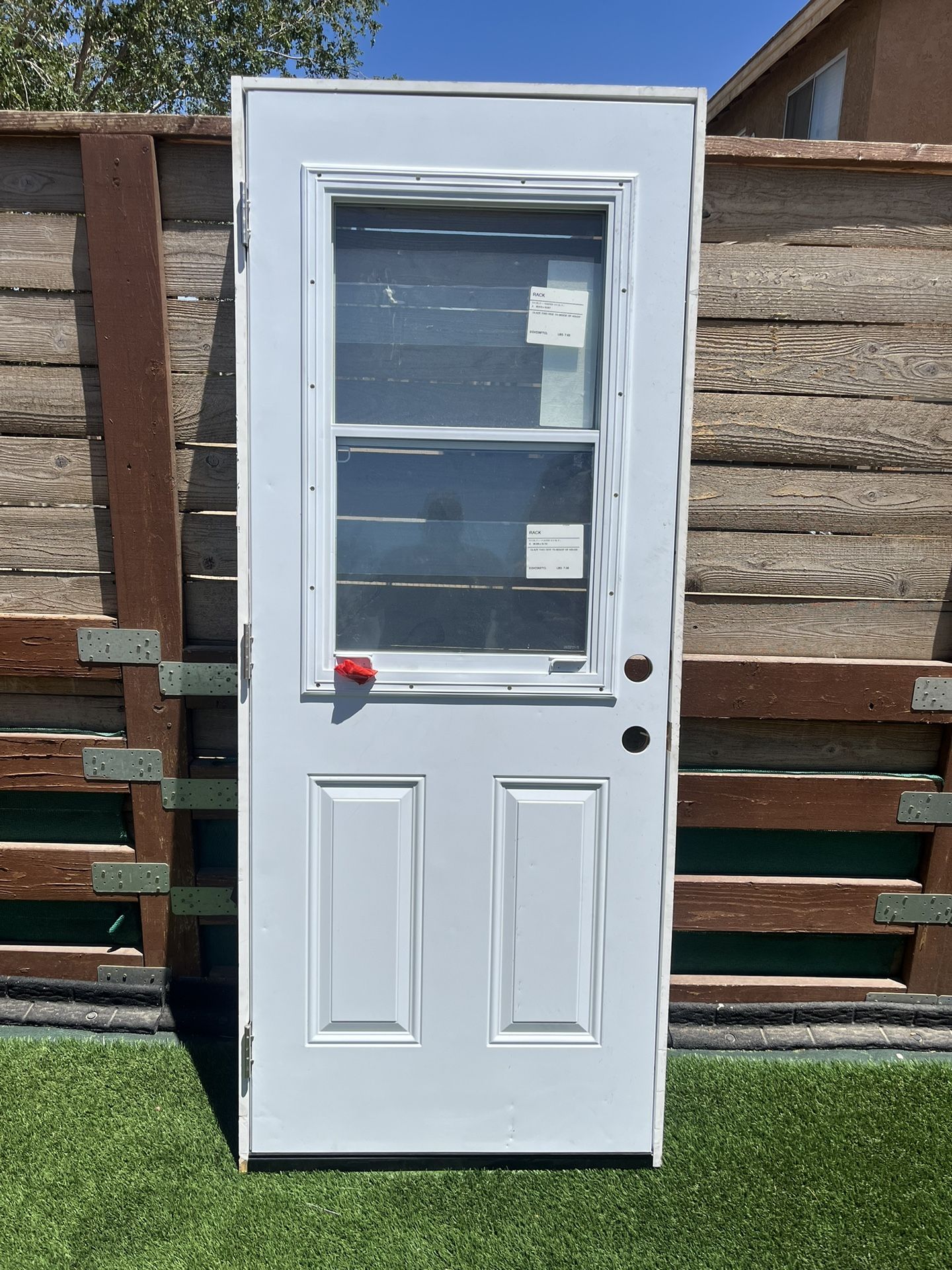 Steel Acero 1/2 Lite Vent Steel White Door. (New with a couple of nicks from storage)