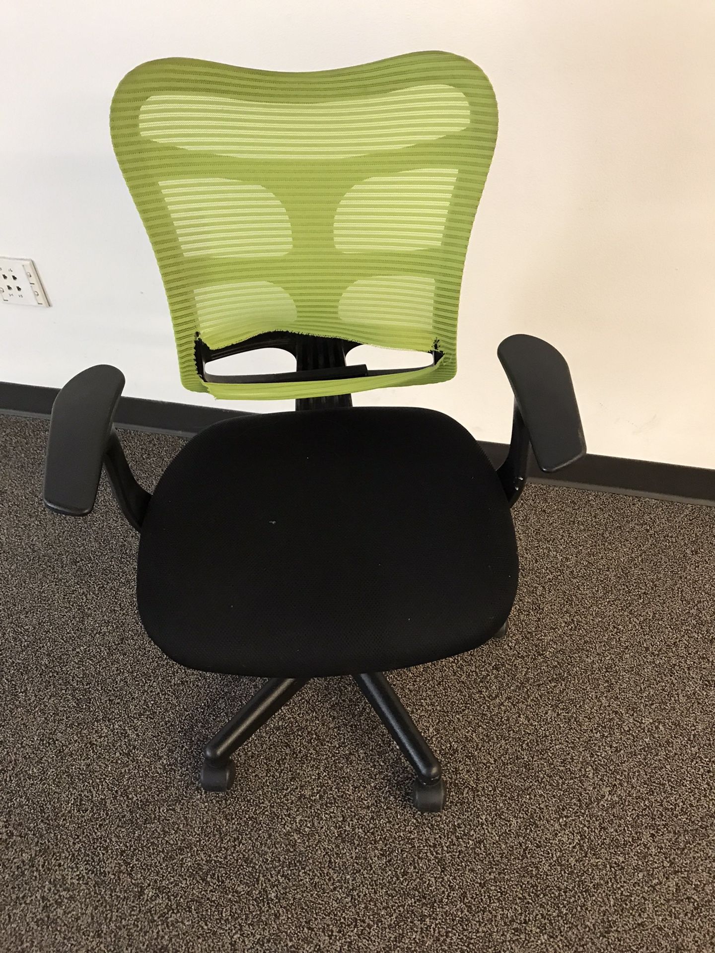 Office chair with rip in back